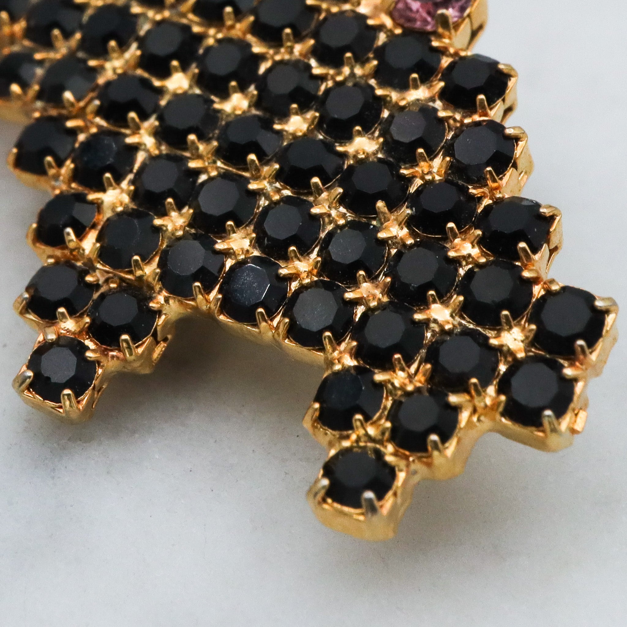 Vintage gold tone rhinestone witch brooch